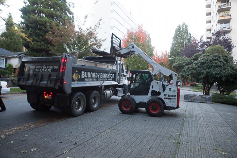 Burnaby blacktop's forklift and dump truck