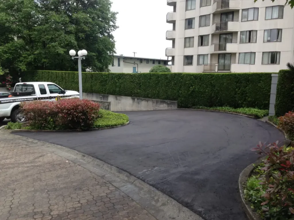 strata entrance with burnaby blacktop truck on the side