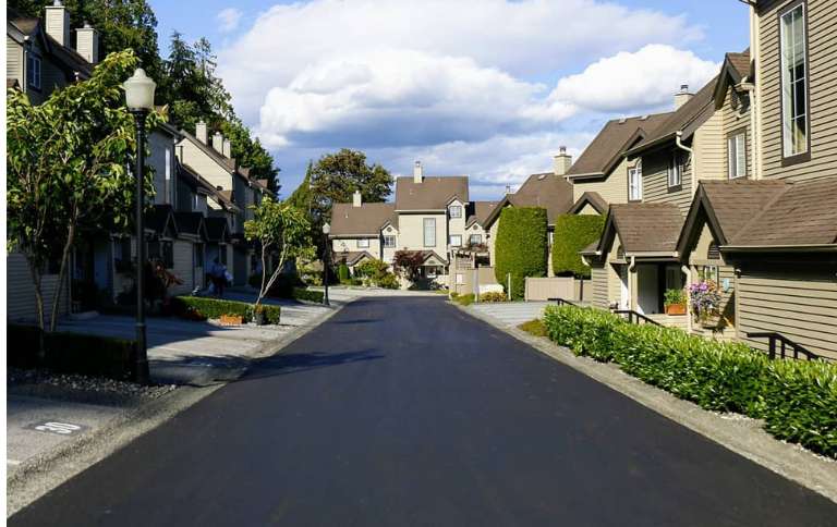 fresh paved driveway in a strata in coquitlam