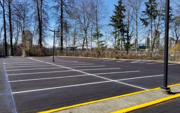 a parking lot with freshly painted parking lines