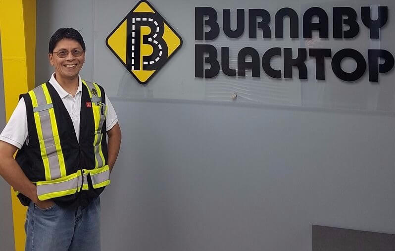 Rafael - Estimator beside the burnaby blacktop logo