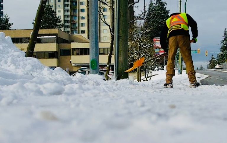 snow shovelling by burnaby blacktop team