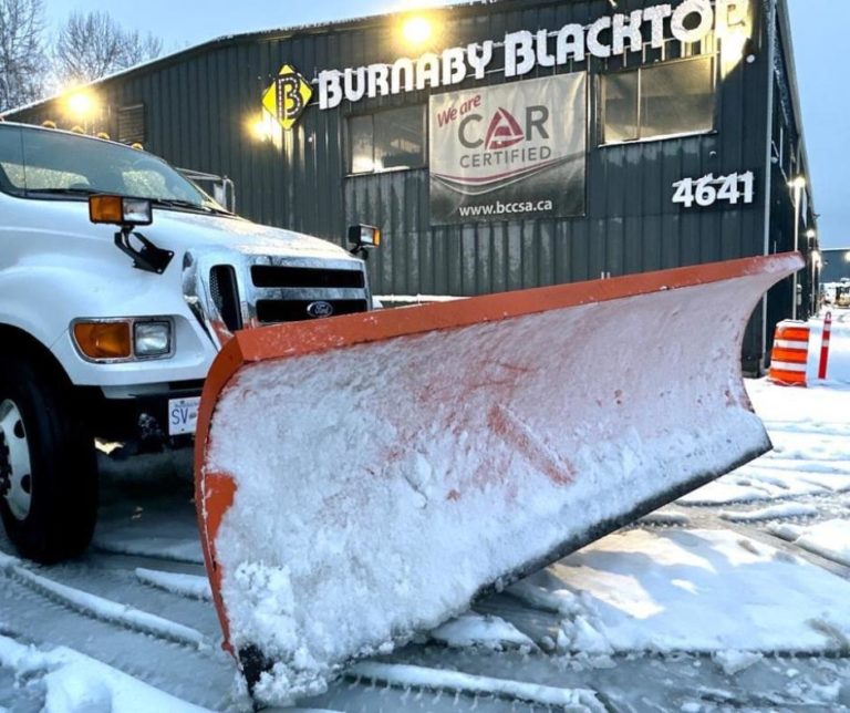 snow plow from Burnaby Blacktop after servicing a property in West Vancouver